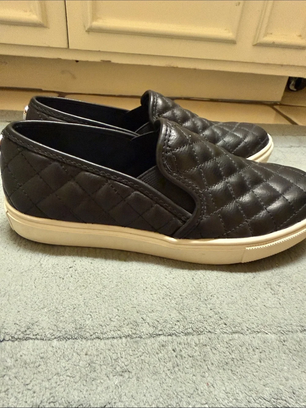Steve Madden Black Quilted Slip-On Sneakers with White Sole
